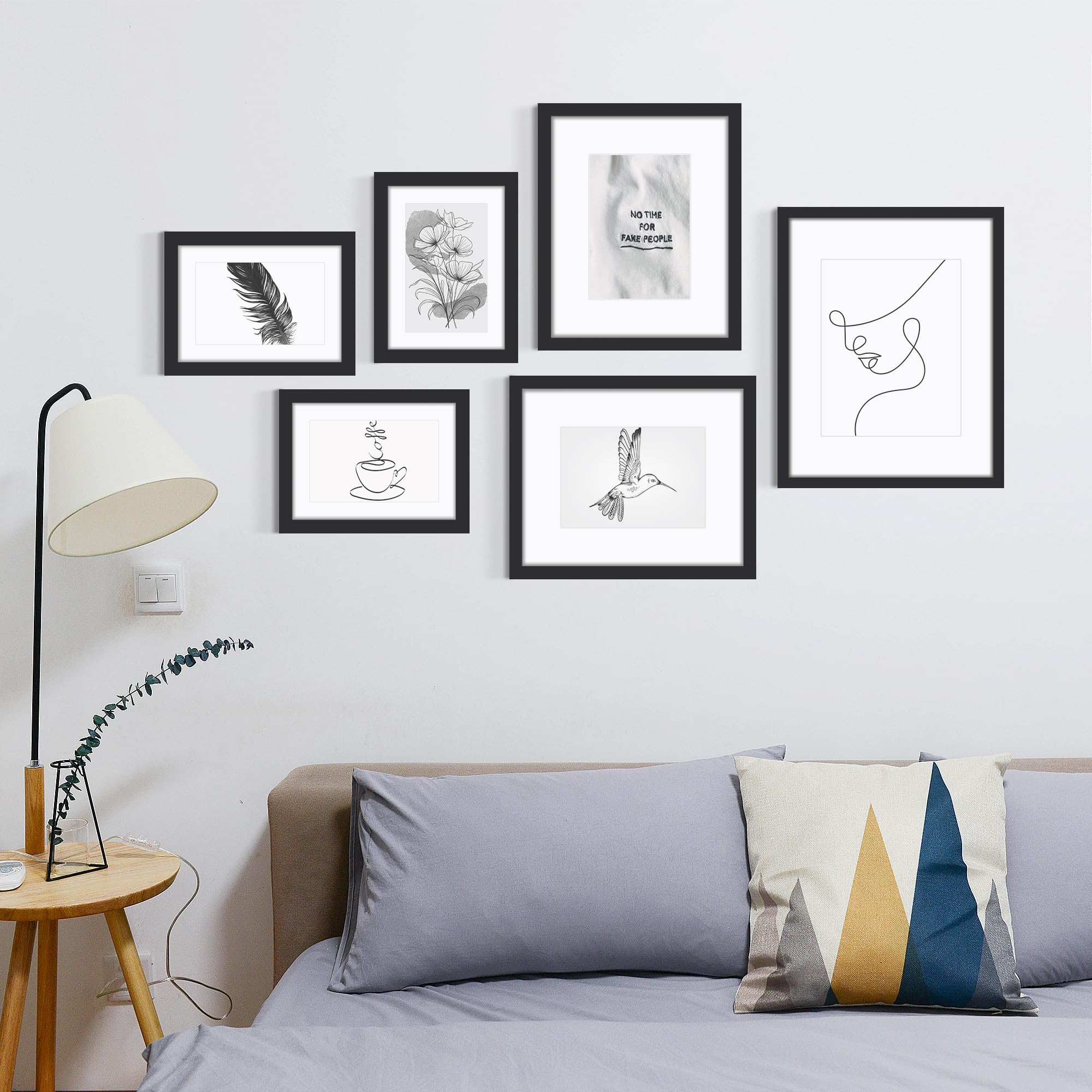 Fisnish black photo frame set, stylish gift-ready decor for any room.