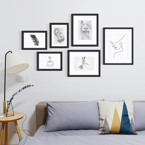 Fisnish black photo frame set, stylish gift-ready decor for any room.