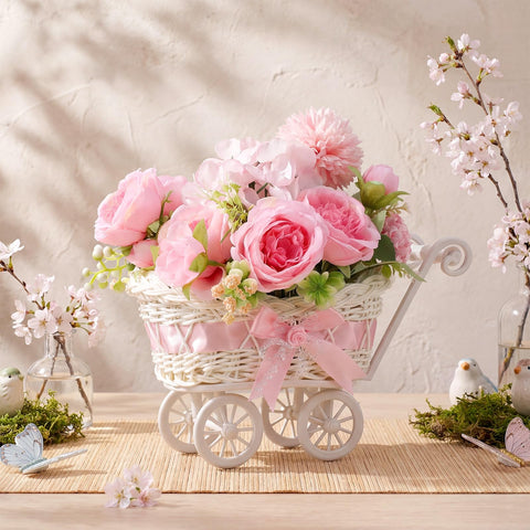 Fiwochic floral centerpiece with bows creates warm, festive ambiance.
