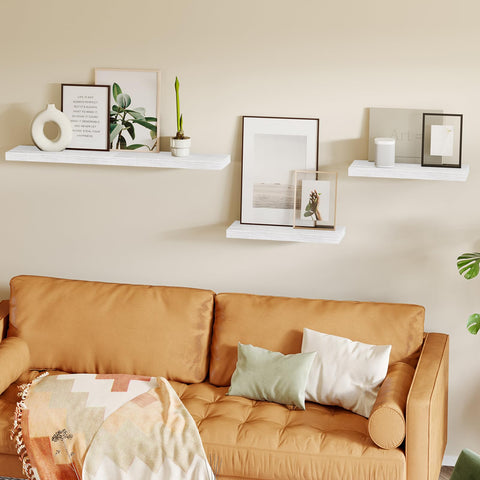 Fixwal bedroom display shelves for plants, photos, and keepsakes with neat spacing.