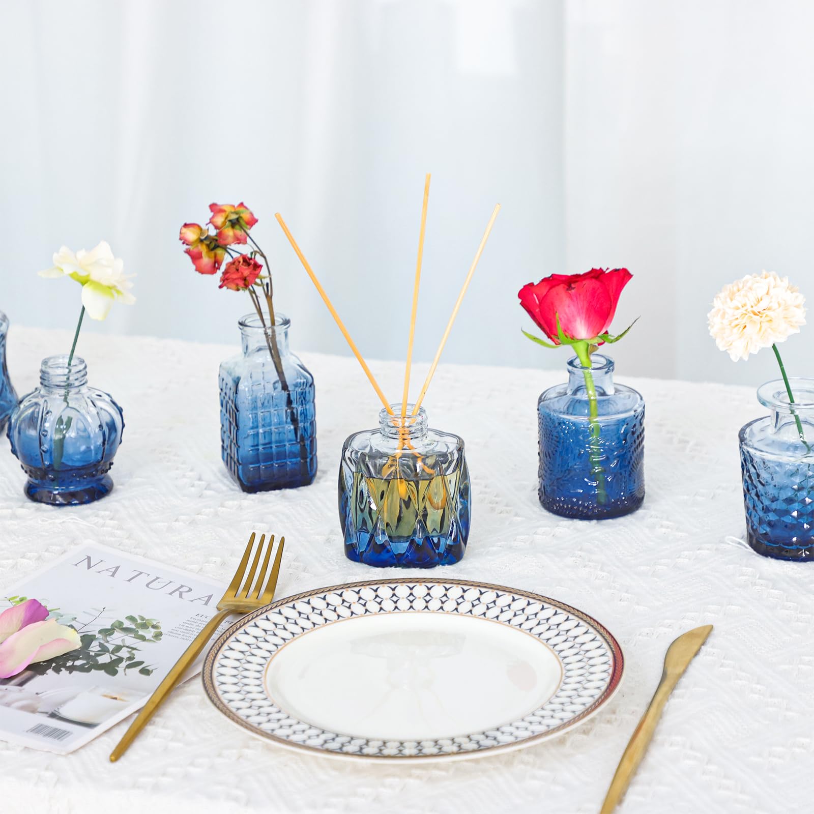 Fixwal blue bud vases varied shapes showcasing versatile centerpiece ideas.