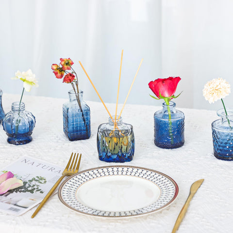 Fixwal blue bud vases varied shapes showcasing versatile centerpiece ideas.