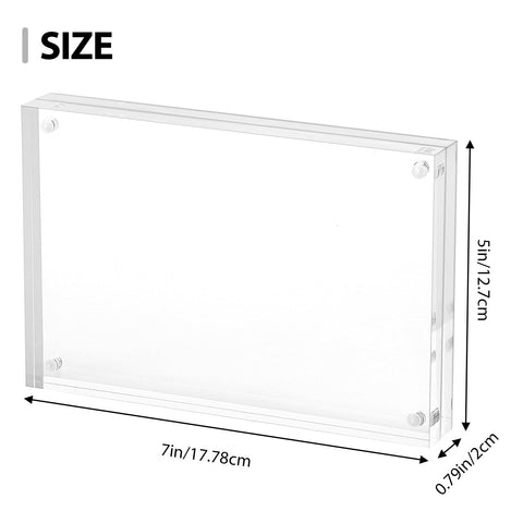 Frameless Fixwal desk frame shows two photos side by side