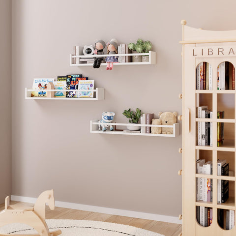Fixwal wall-mounted shelves hold books and toys neatly.
