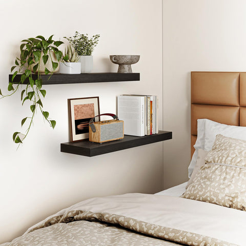 Fixwal bathroom essentials stored on black floating shelf