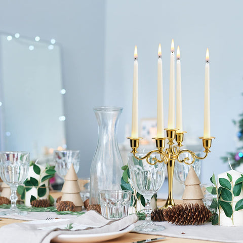 FlameCan Ivory taper candles 10 inches tall provide long-lasting ambiance for weddings and dinners.