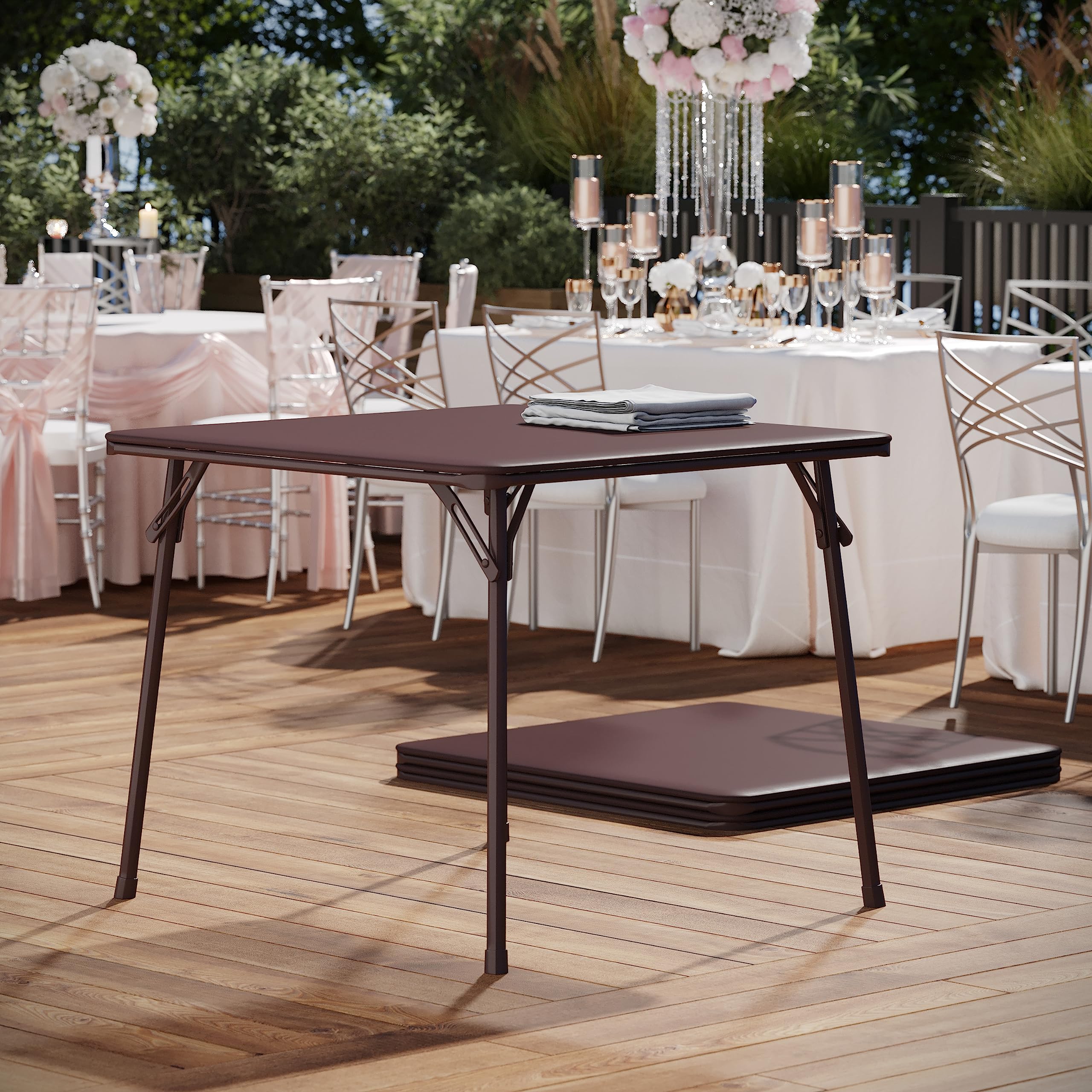 Flash Furniture Madelyn portable brown folding table in use for events.
