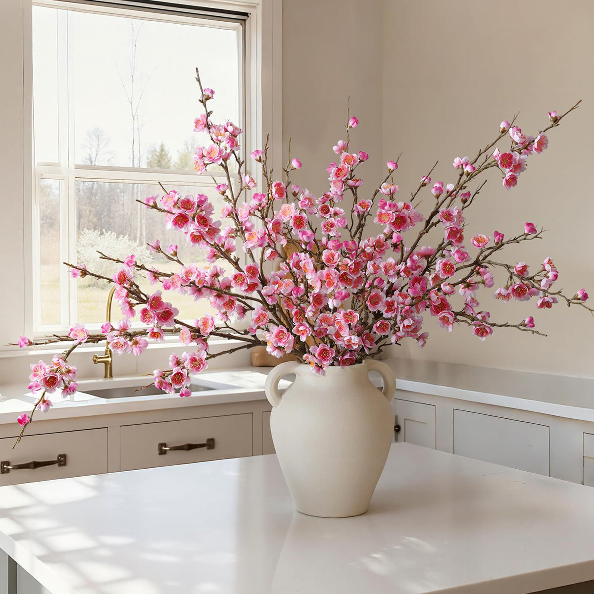 Florisso pink cherry blossom branch close-up shows durable silk petals for elegant decor.