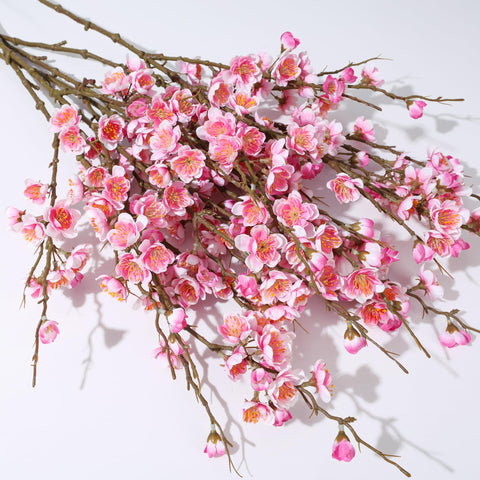 Florisso pink cherry blossom branch packaging and display-ready presentation.