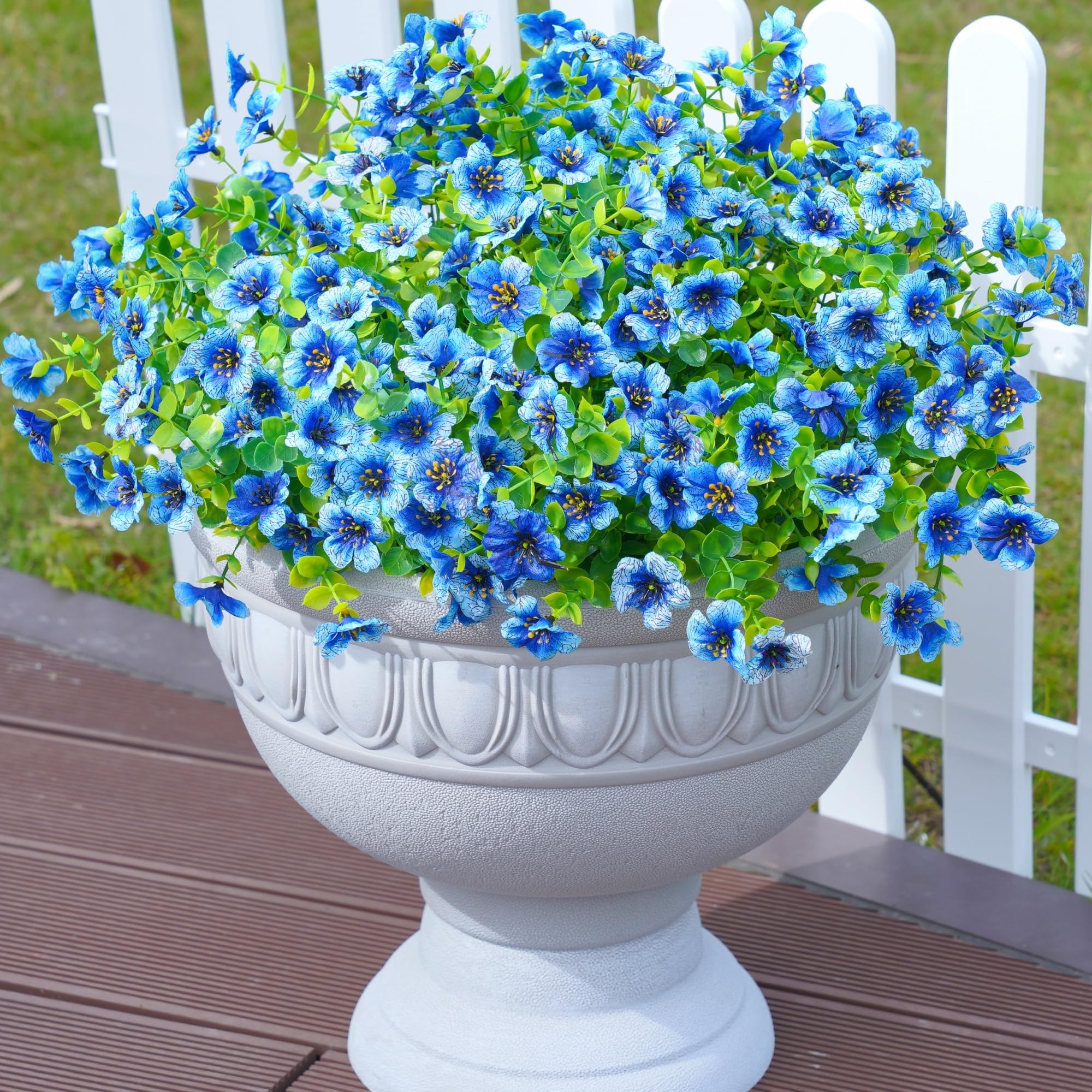 Florisso daisy branches made with durable materials withstand outdoor weather.