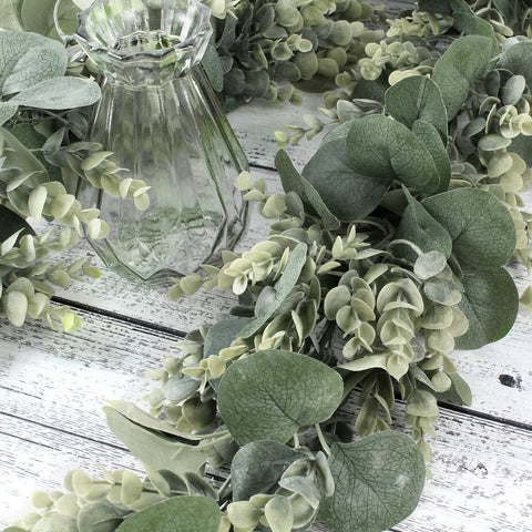 Florlab greenery garland closeup showcases silk leaves and wood-like stems