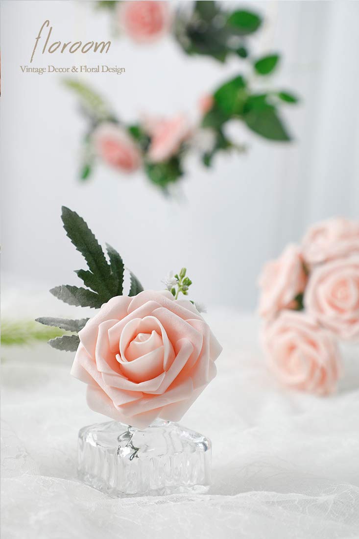 Floroom blush foam roses on stems brightening wedding cake displays.
