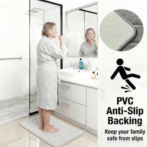 Flotstiga bath mat trio arranged for versatile placement in a bathroom.