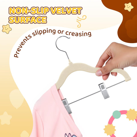 Adjustable clips on Flottian hangers securely hold varied kid garments.