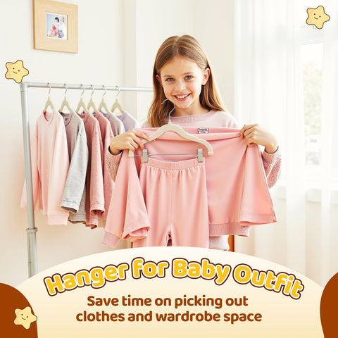 Slim velvet hangers help keep the baby wardrobe organized and accessible.