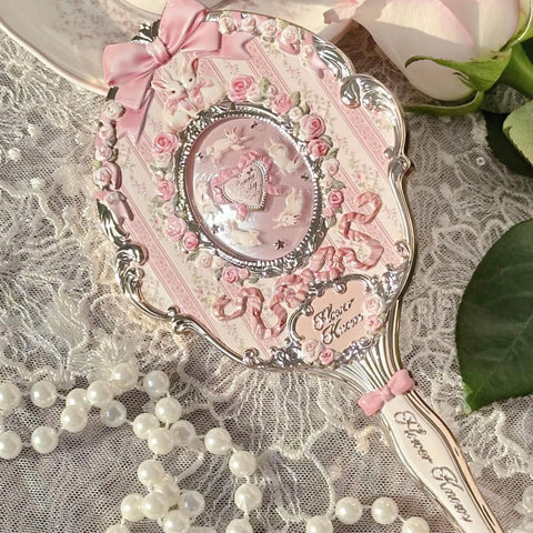 Flower Knows Long Handled Mirror offers an easy grip for touch-ups