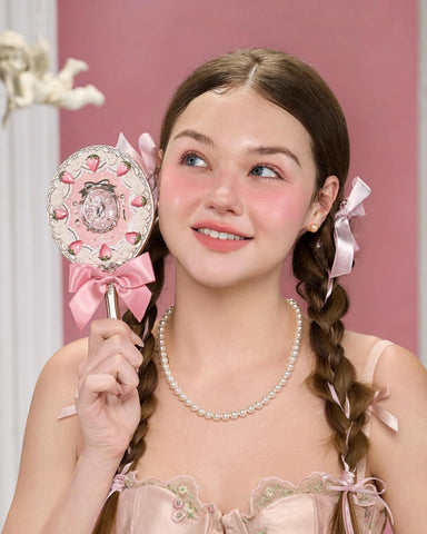 Flower Knows Strawberry Cupid mirror handle provides easy grip during use