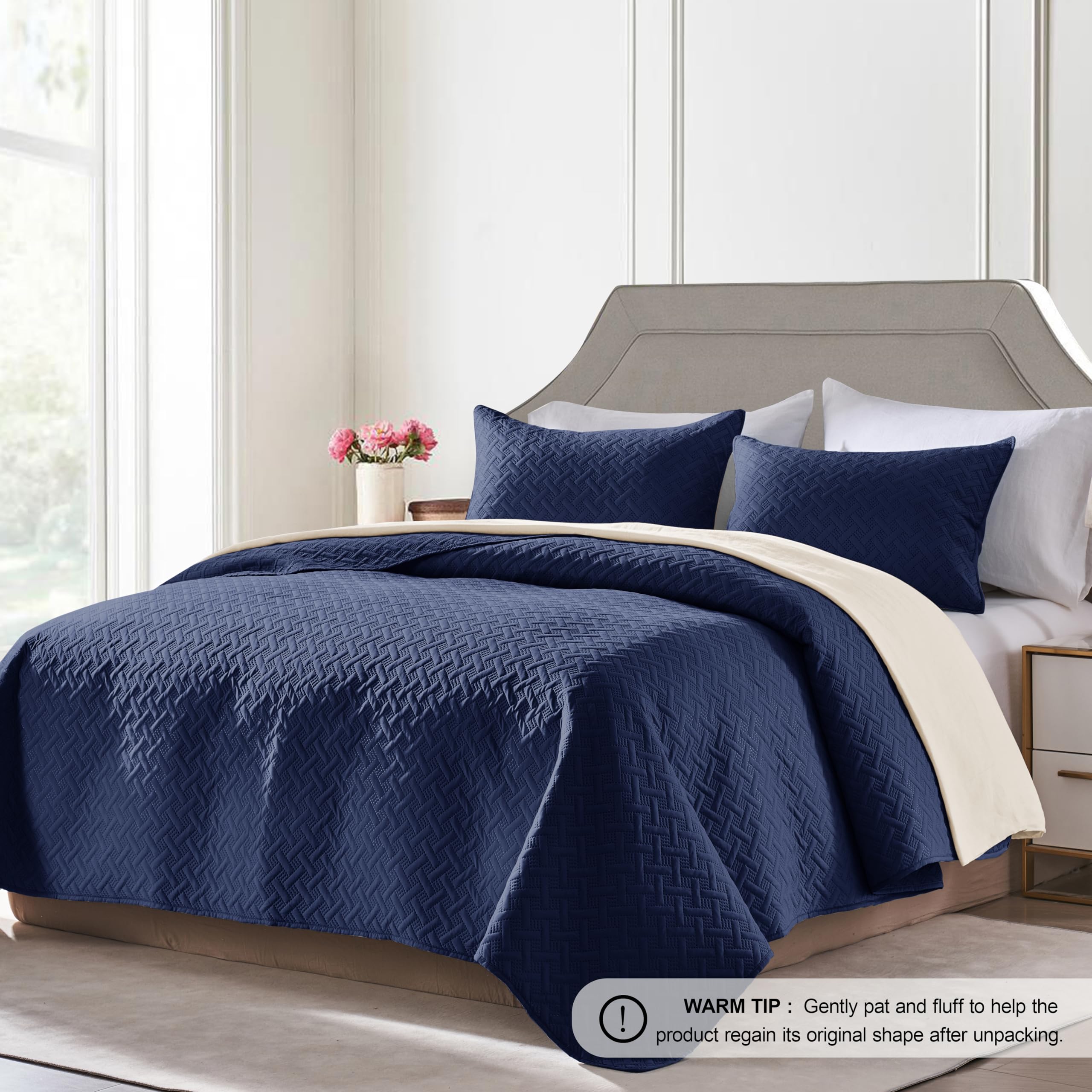 FLYMME navy quilt with two shams completes a cozy bed setup
