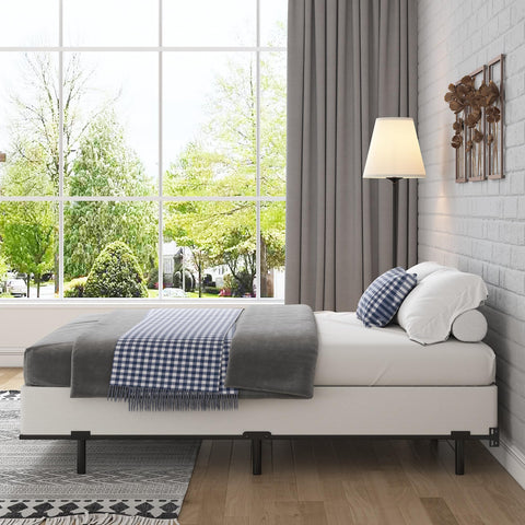 Bedroom scene with bed elevated by FMDMR box spring and tidy appearance