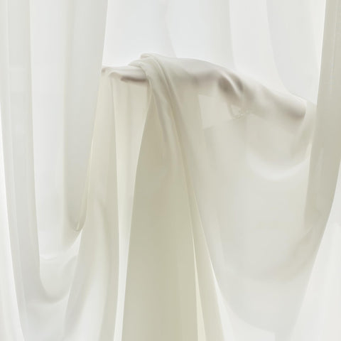 FMFUNCTEX light-filtering curtains brightening a room while preserving privacy