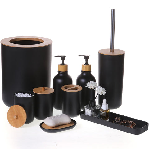 FNGJMJG matte black 9-piece bathroom set on a clean vanity for organized elegance