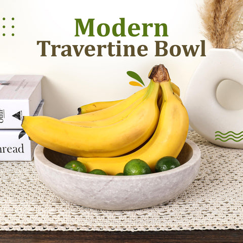 FNTSTICGOODS travertine bowl used to hold keys and small accessories.