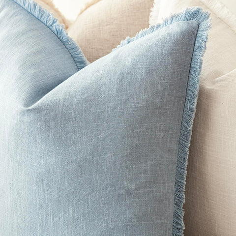 Foindtower 24x24 inch cover displayed on sofa for layered decor