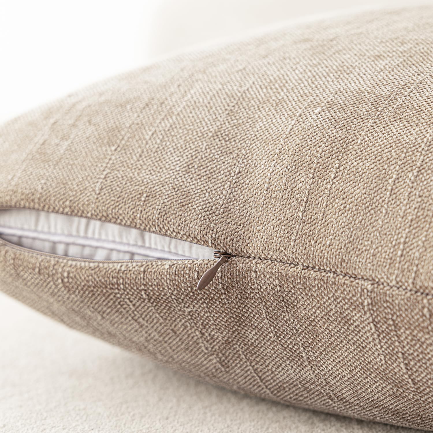 Foindtower cream camel pillow cover adds versatile, neutral decor to any room.