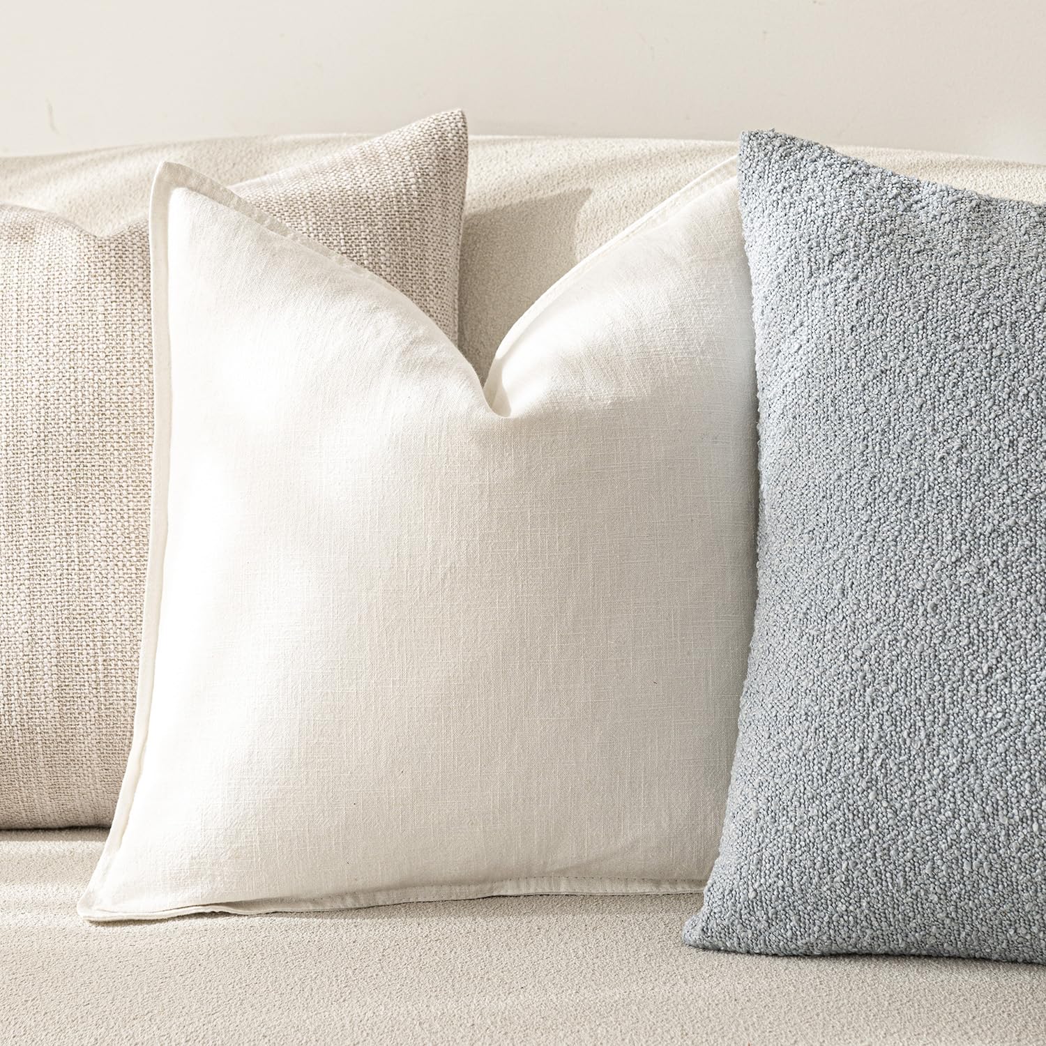 Foindtower decorative boho-style cream pillow cover adds neutral charm.