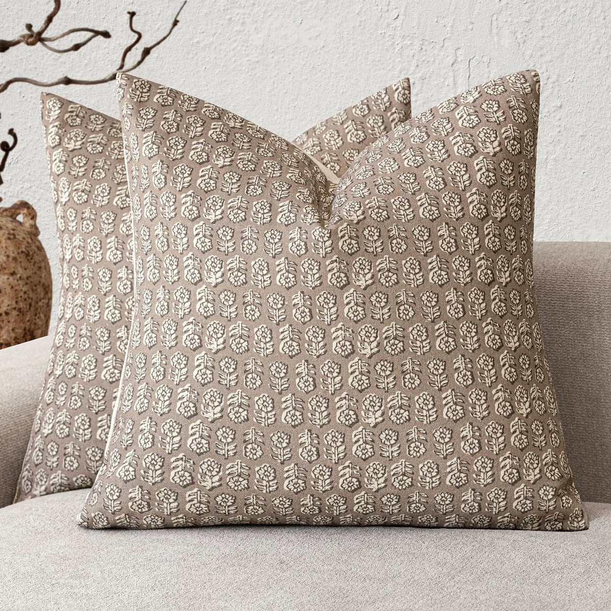 Foindtower floral pillow cover in tan and taupe enhances living room texture.