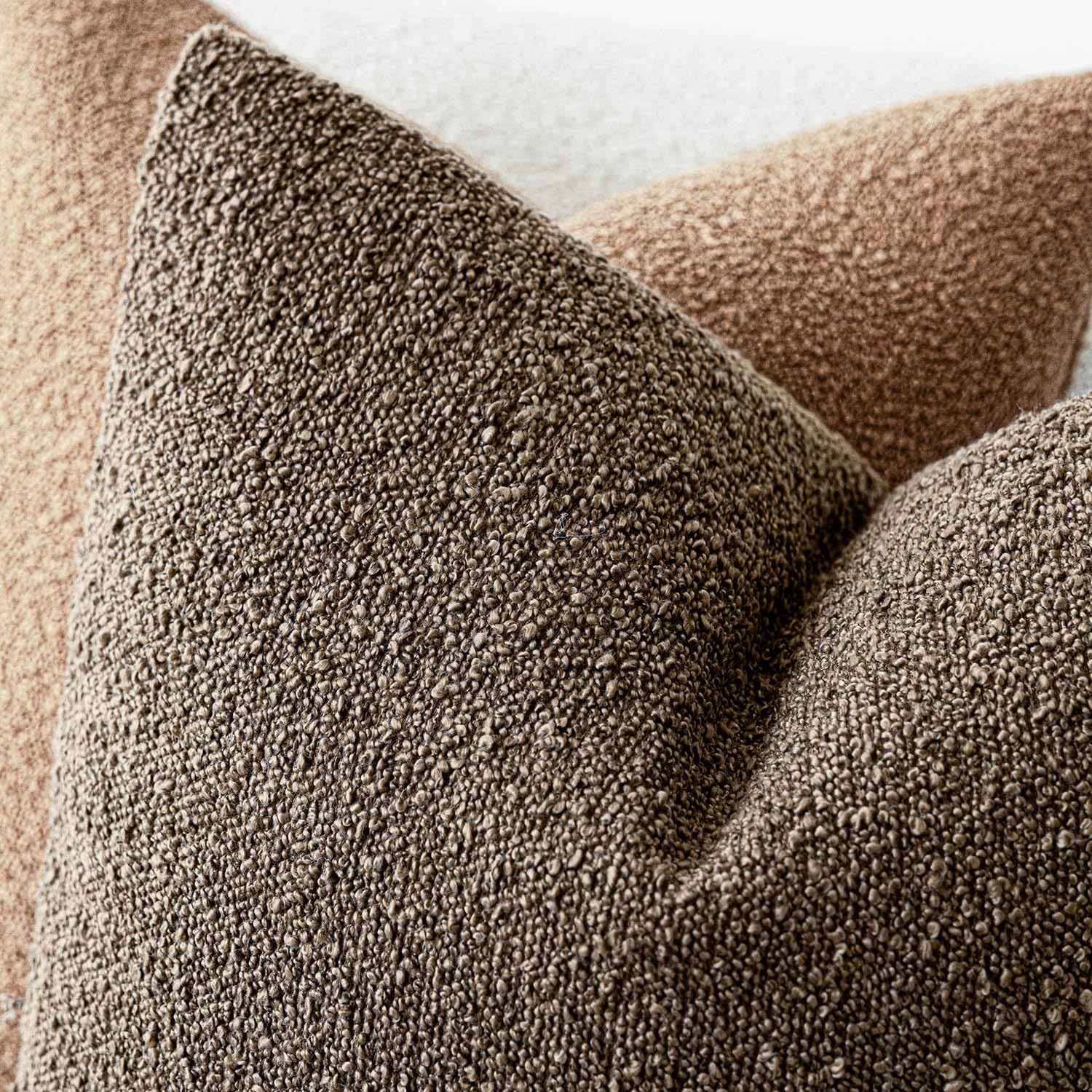 Foindtower neutral-tone pillow cover adds calm texture to spaces.