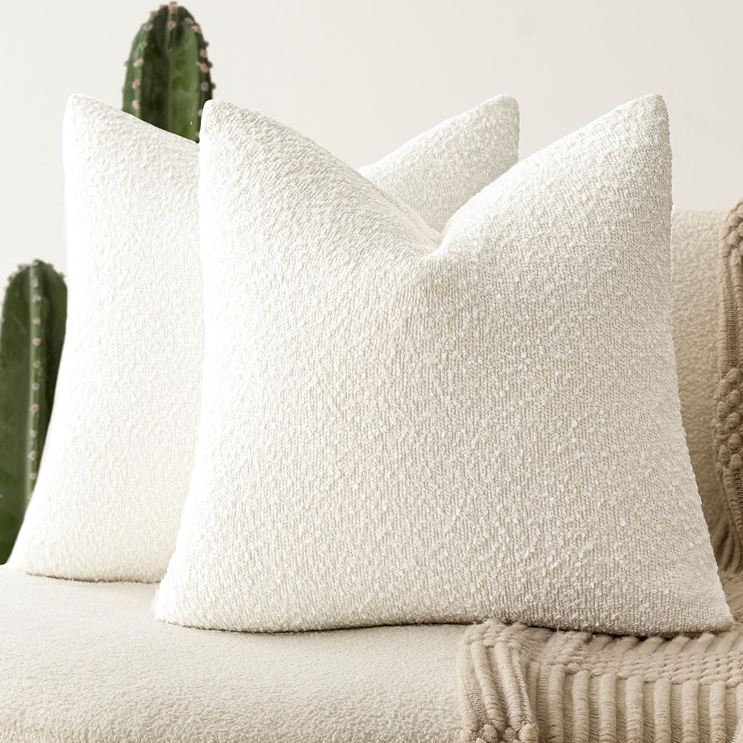 Foindtower Pack-2 20x20 bouclé pillow cover adds textured style to any sofa.