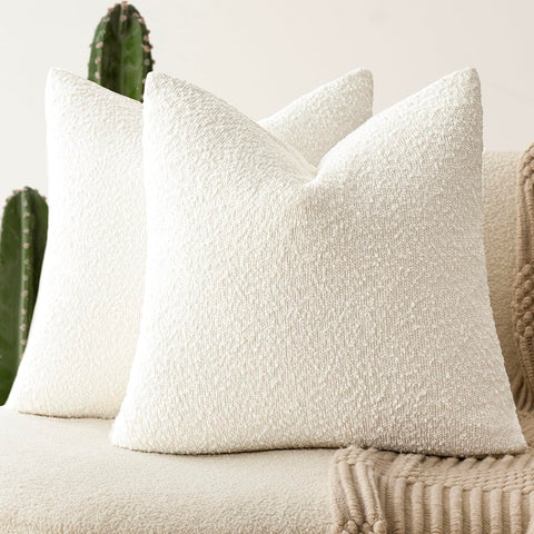 Foindtower Pack-2 20x20 bouclé pillow cover adds textured style to any sofa.