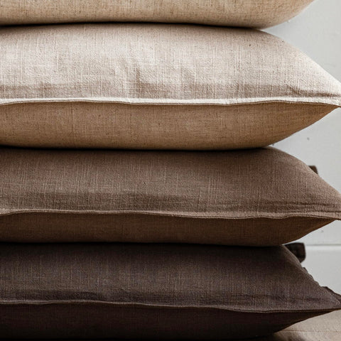 Foindtower linen pillow cover on bed for relaxed bedroom vibe.