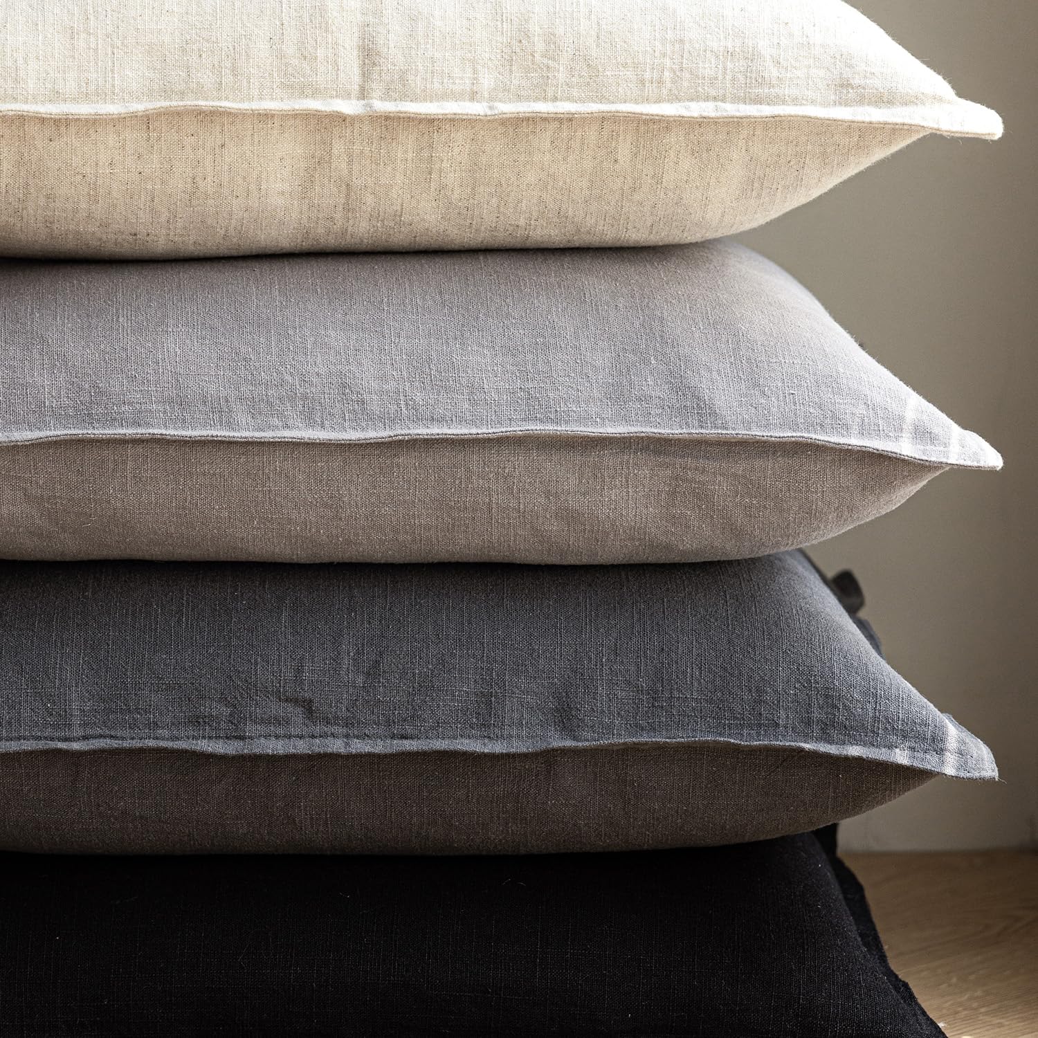 Foindtower pillow cover suitable for both indoor and outdoor spaces in neutral black.