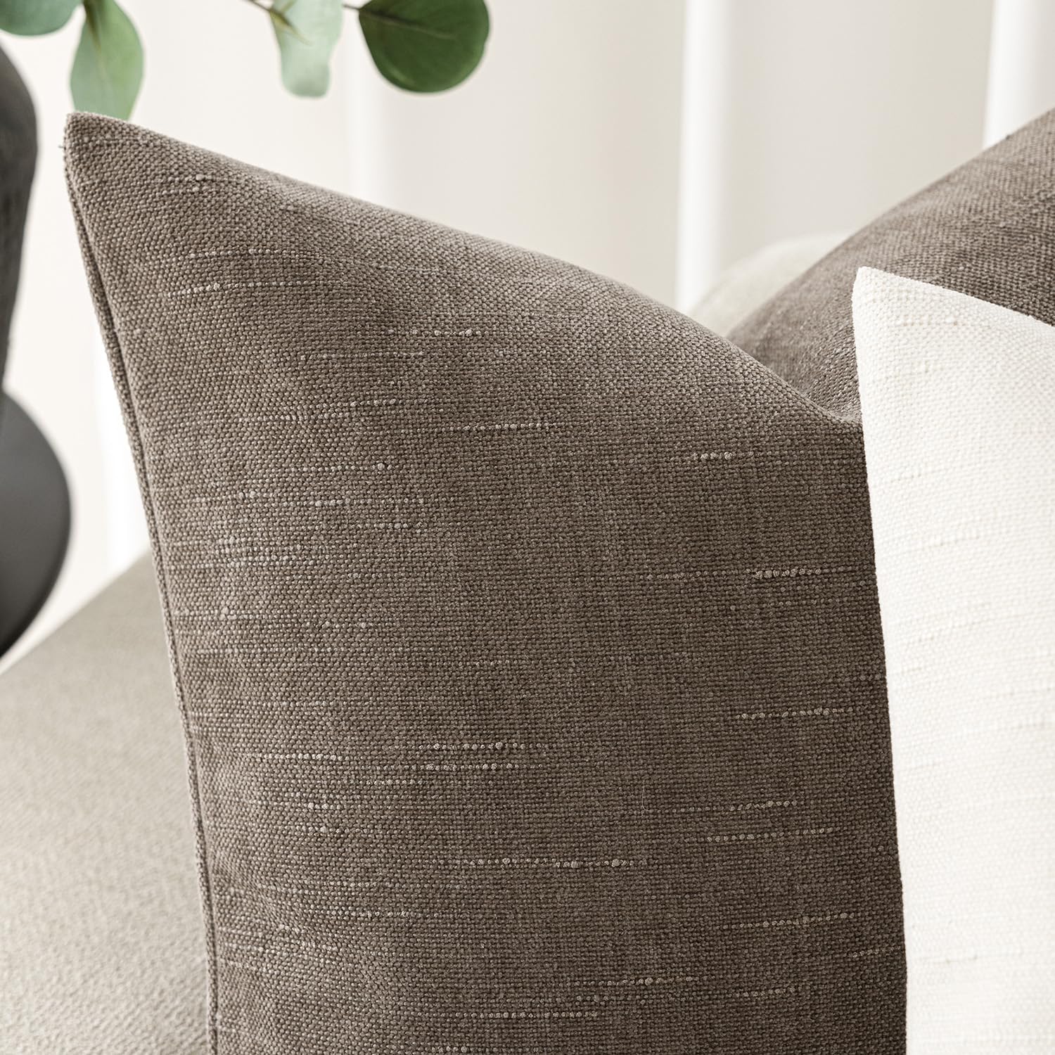 Foindtower slubby chenille pillow cover adds tactile detail for elevated sofa aesthetics
