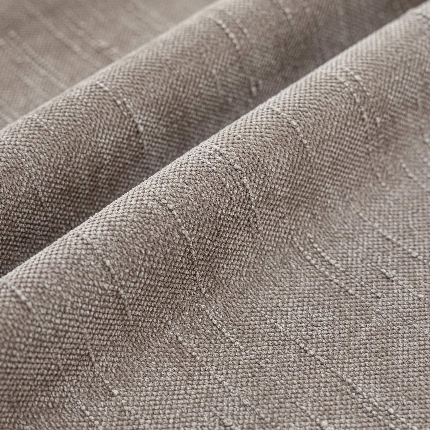 Foindtower slubby-weave chenille cushion cover enhances texture and depth on a sofa.