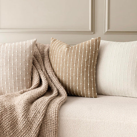 Foindtower soft boucle texture enhances comfort on couches and beds.