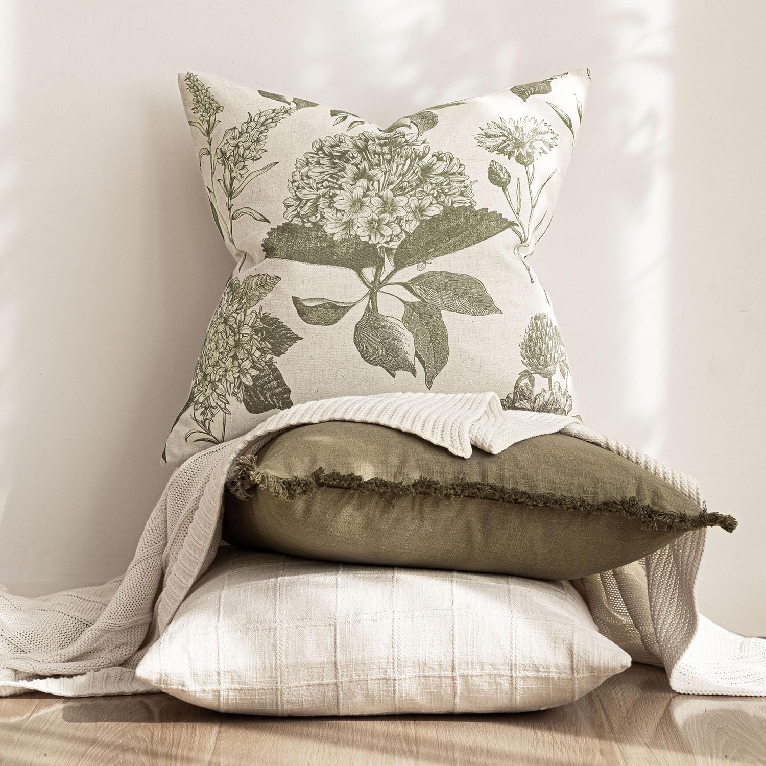 Foindtower soft textured fabric pillow cover adds cozy feel to living spaces.