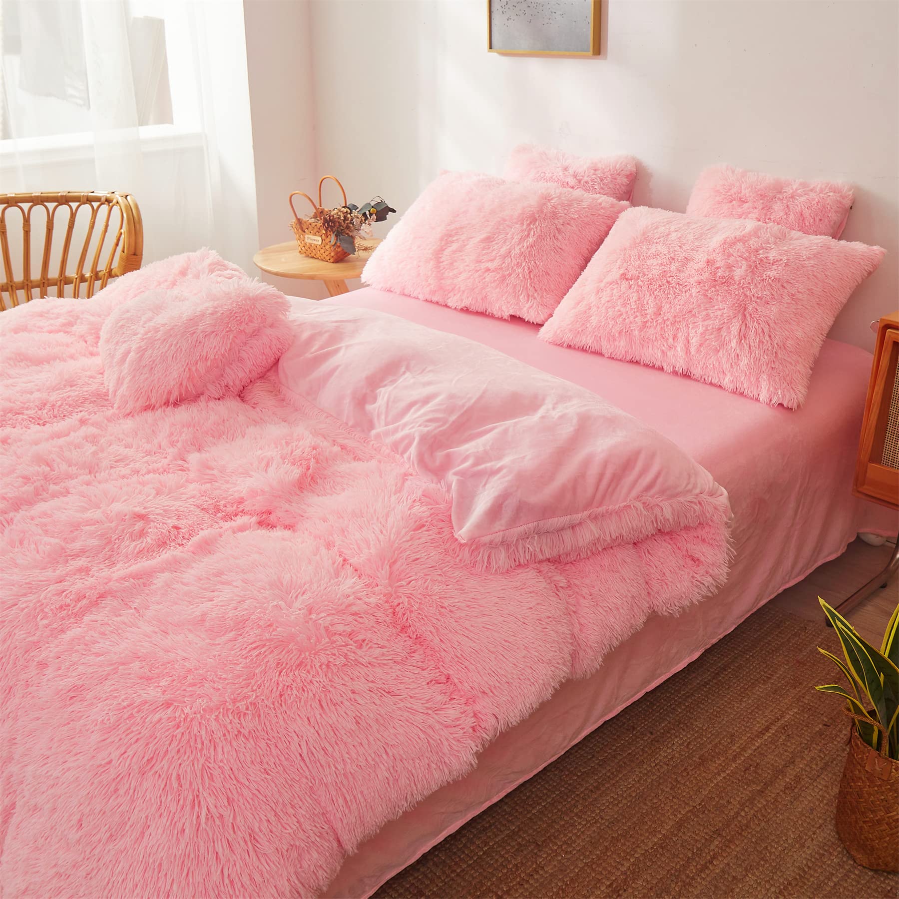 FOPPA matching pink pillowcases tied to a plush bed look.
