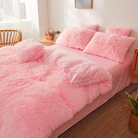 FOPPA matching pink pillowcases tied to a plush bed look.