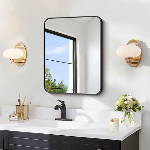 FORBATH 18x24-inch black rectangular mirror enhances bathroom space with a sleek focal point.