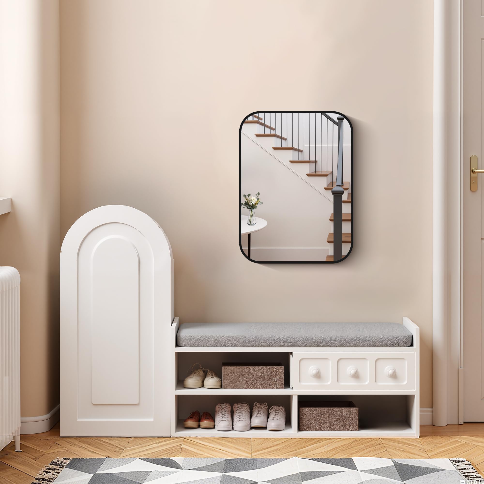 FORBATH black metal-frame mirror provides modern wall accent for any bathroom setting.