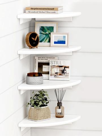 Forbena White Corner Floating Shelves set 4 on a wall corner, ideal for tidy small spaces.