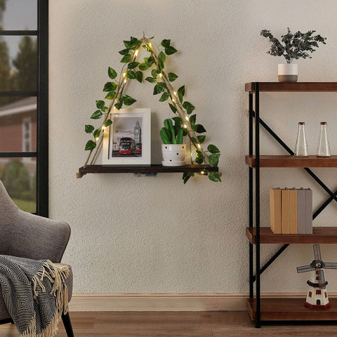 Forest Angle shelf with LED lighting and ivy wreath creates warm ambience