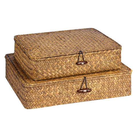 FOSSORH flat seagrass storage bin with lid in caramel on a shelf.