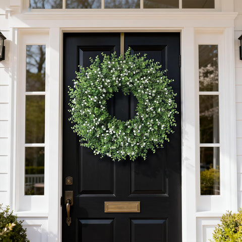 Close-up of FOTEEWL wreath leaves shows lifelike texture and vibrant green tones