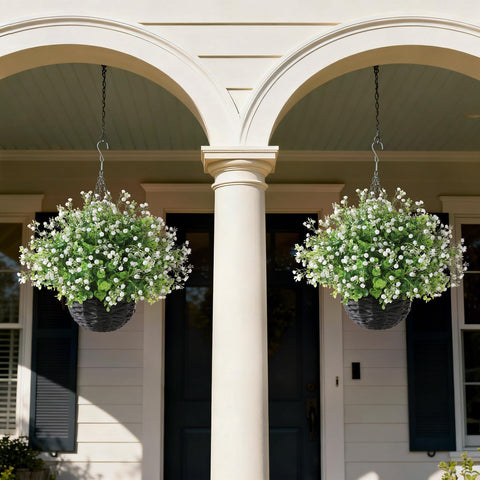 Two FOTEEWL baskets with metal chains hang gracefully on a porch railing.