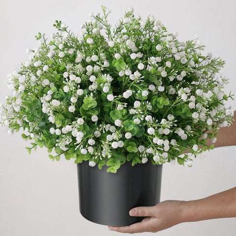 FOTEEWL lavender accents and green boxwood create tranquil spaces.