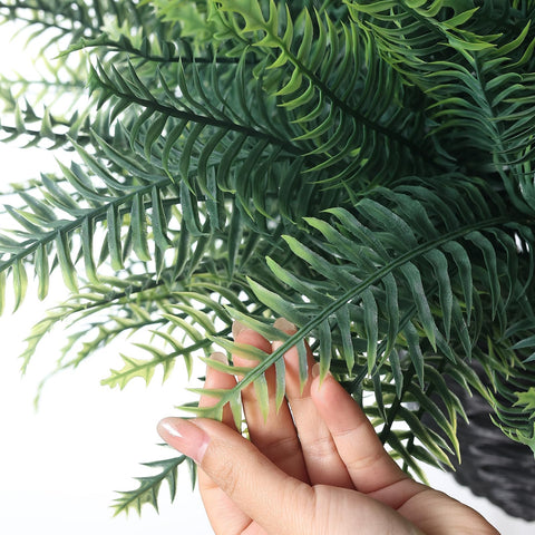 FOTEEWL garden and yard decor adds evergreen charm to any space
